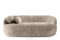 Zaokrąglona sofa w stylu modern tkanina szenil beżowy